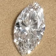 a loose marquise cut diamond photographed in our showroom
