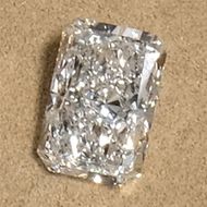a loose radiant cut diamond photographed in our showroom